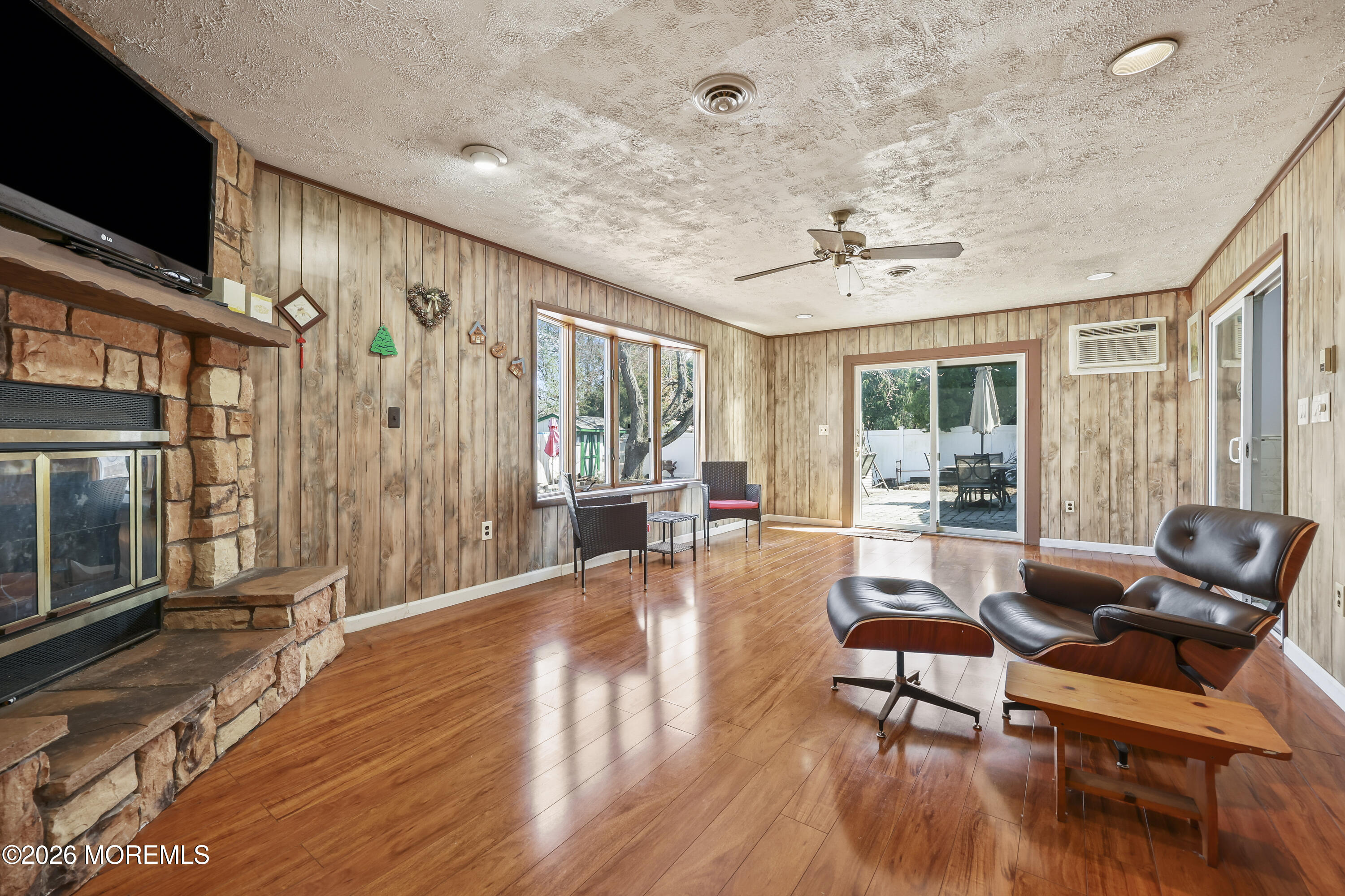 287 Church Street Aberdeen, NJ 07747 - Photo 7 of 15 a living room with furniture and a flat screen tv