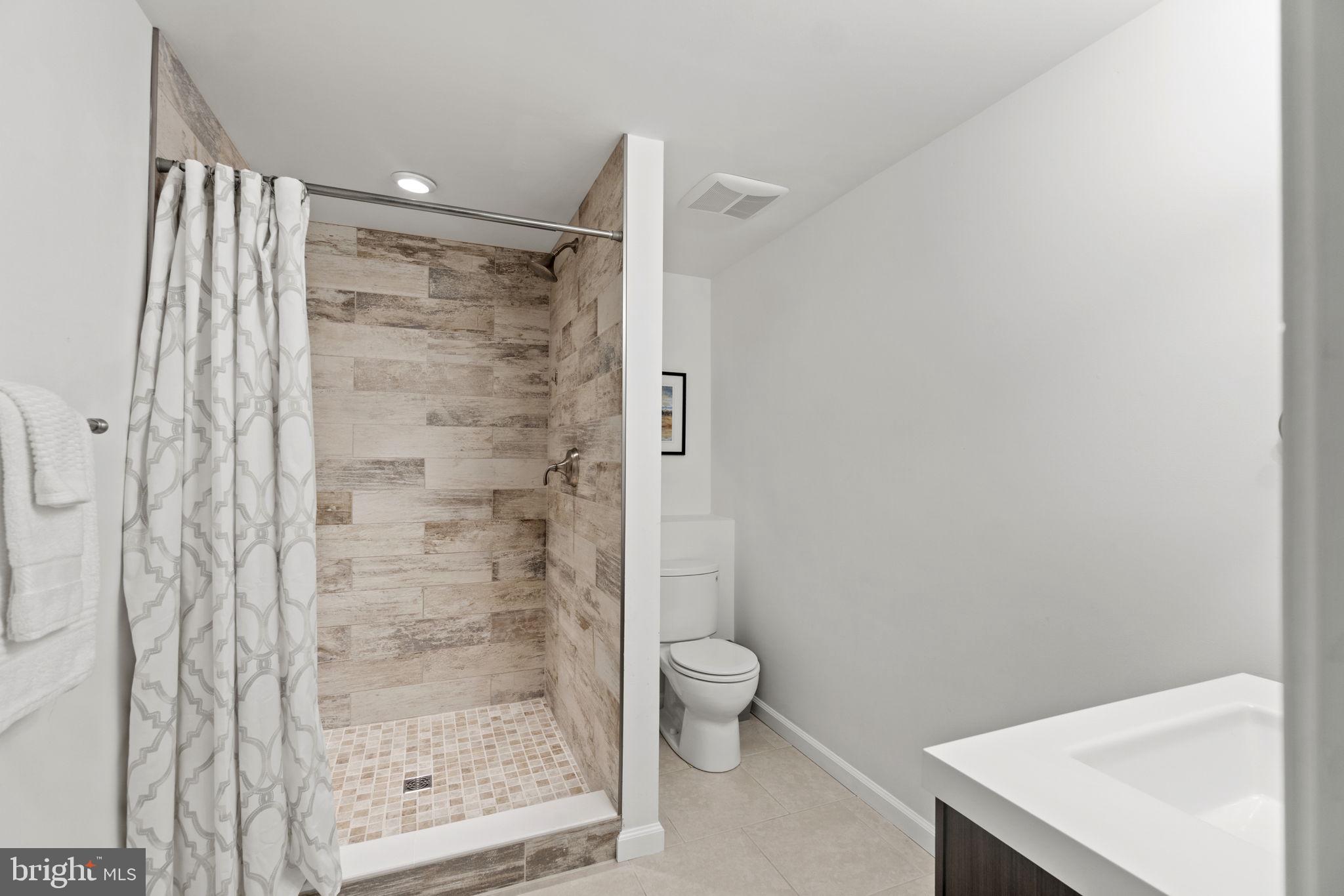 12741 Triple Crown Road North Potomac, MD 20878 - Photo 33 of 41 Lower Level Full Bathroom