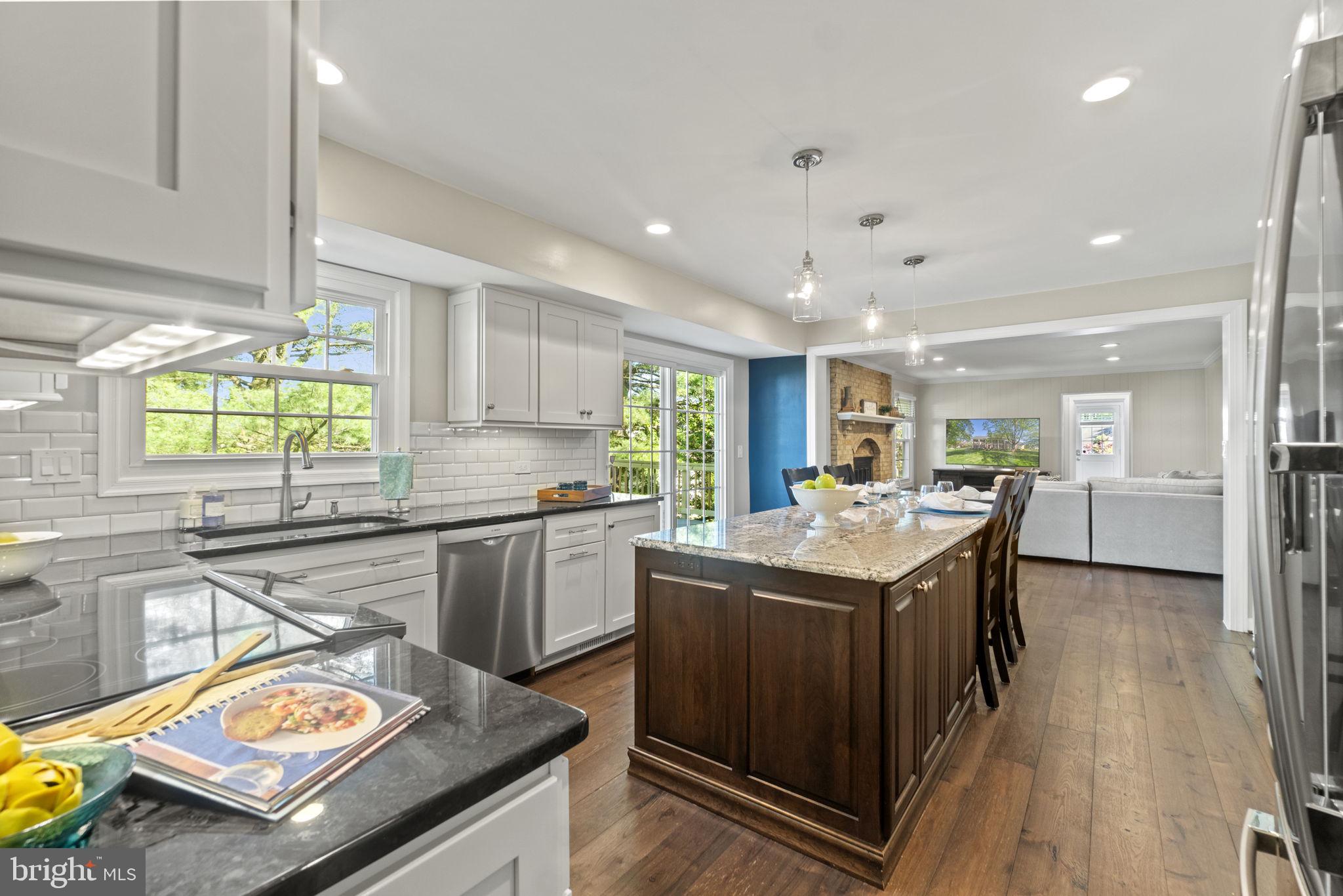 12741 Triple Crown Road North Potomac, MD 20878 - Photo 9 of 41 Kitchen Opening to Family Room
