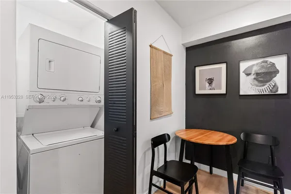 a bathroom with a toilet a sink and a mirror
