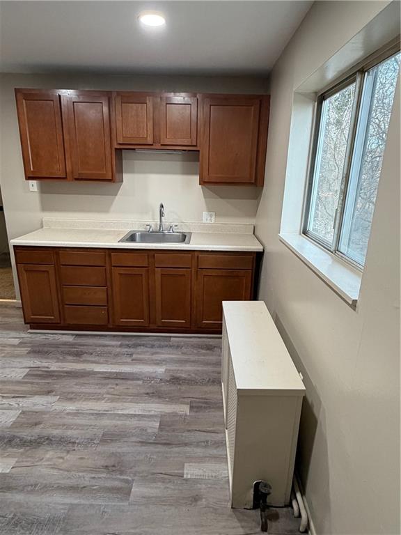 1706 Rhine Street Pittsburgh, PA 15212 - Photo 3 of 19 a kitchen with stainless steel appliances granite countertop wooden cabinets sink and stove top oven