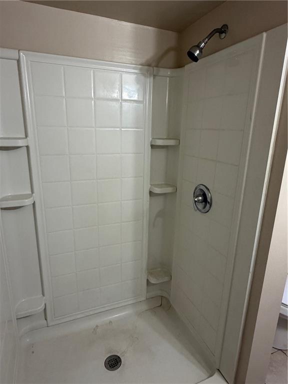 1706 Rhine Street Pittsburgh, PA 15212 - Photo 8 of 19 a bathroom with a glass shower door