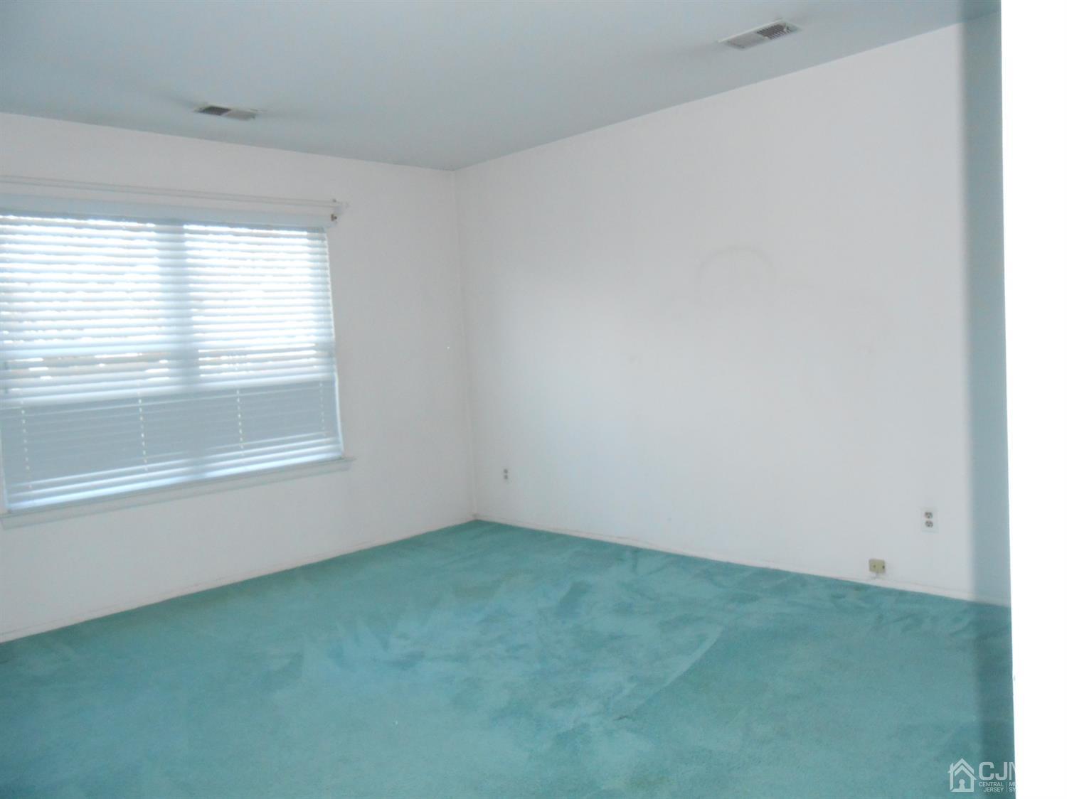 2 Rainford Road Edison, NJ 08820 - Photo 12 of 25 an empty room with a window
