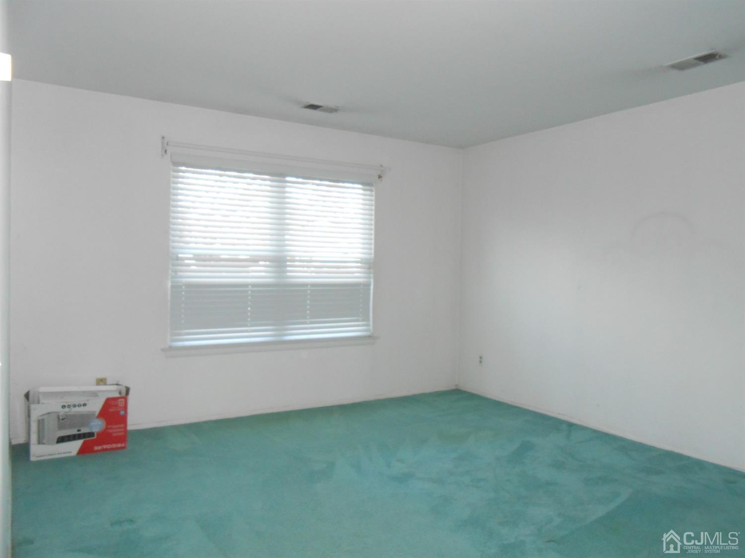 2 Rainford Road Edison, NJ 08820 - Photo 15 of 25 an empty room with a window
