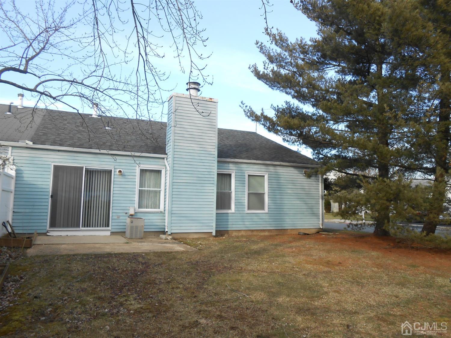 2 Rainford Road Edison, NJ 08820 - Photo 24 of 25 front view of a house with a trees