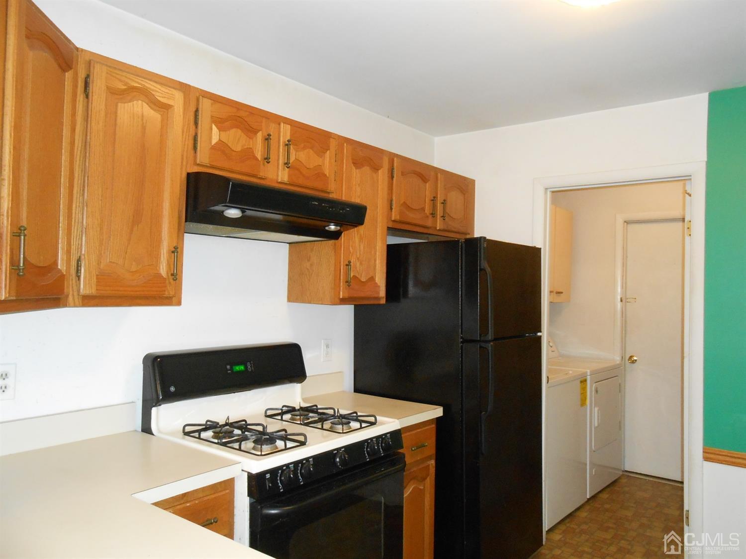 2 Rainford Road Edison, NJ 08820 - Photo 5 of 25 a kitchen with stainless steel appliances granite countertop a refrigerator and a stove