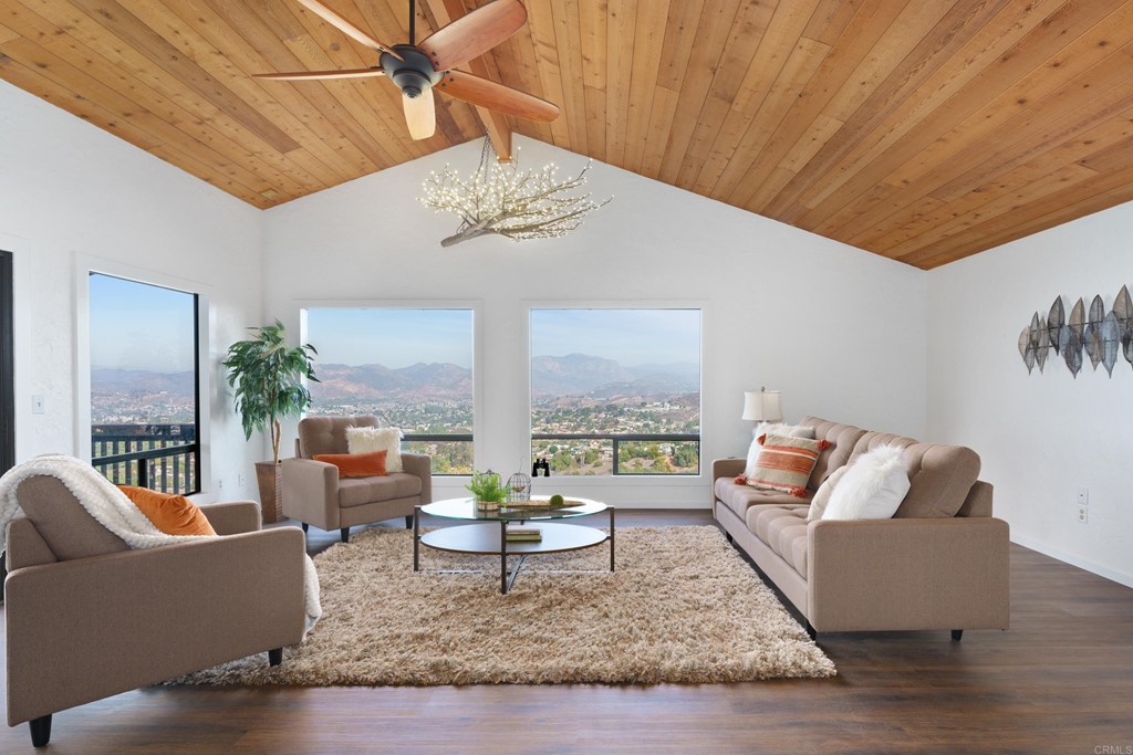 8764 Golden Ridge Road Lakeside, CA 92040 - Photo 1 of 62 a living room with furniture rug and a table