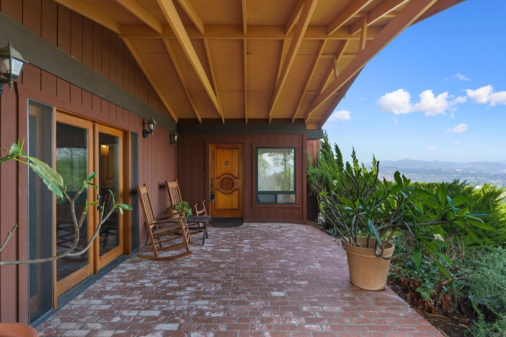8764 Golden Ridge Road Lakeside, CA 92040 - Photo 3 of 62 a view of a porch with chairs and potted plants
