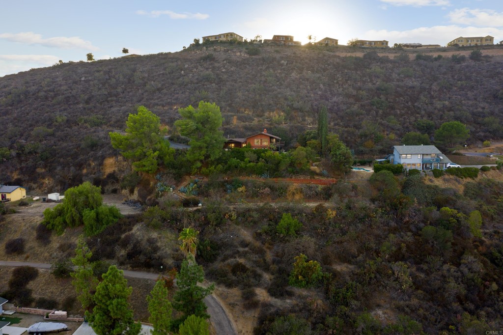 8764 Golden Ridge Road Lakeside, CA 92040 - Photo 50 of 62 a view of a house with a field
