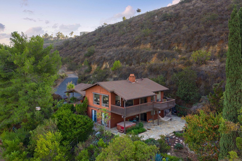 8764 Golden Ridge Road Lakeside, CA 92040 - Photo 54 of 62 an aerial view of a house with roof deck front of house