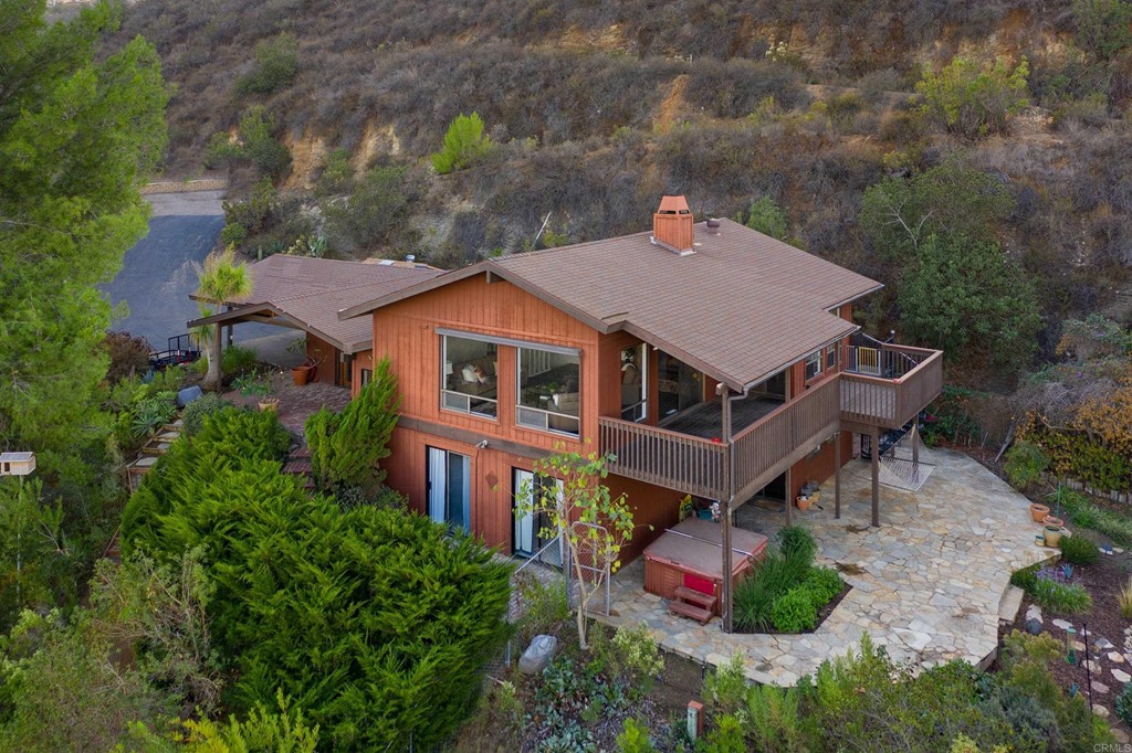 8764 Golden Ridge Road Lakeside, CA 92040 - Photo 56 of 62 an aerial view of a house with a yard