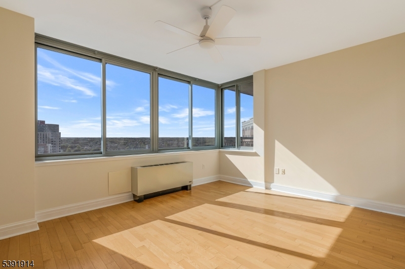 1 Spring Street, Unit 1704 New Brunswick, NJ 08901 - Photo 24 of 44 a large white tub sitting next to a window