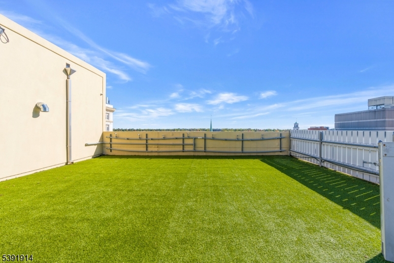 1 Spring Street, Unit 1704 New Brunswick, NJ 08901 - Photo 34 of 44 a view of outdoor space and yard