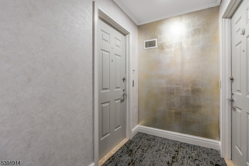 1 Spring Street, Unit 1704 New Brunswick, NJ 08901 - Photo 5 of 44 a bathroom with a shower