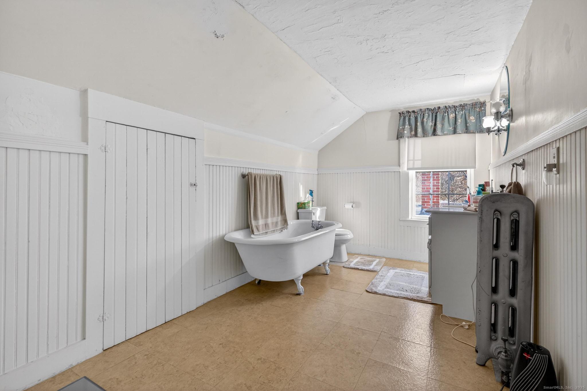 18 Broad Street Killingly, CT 06239 - Photo 16 of 21 a living room with furniture and a window