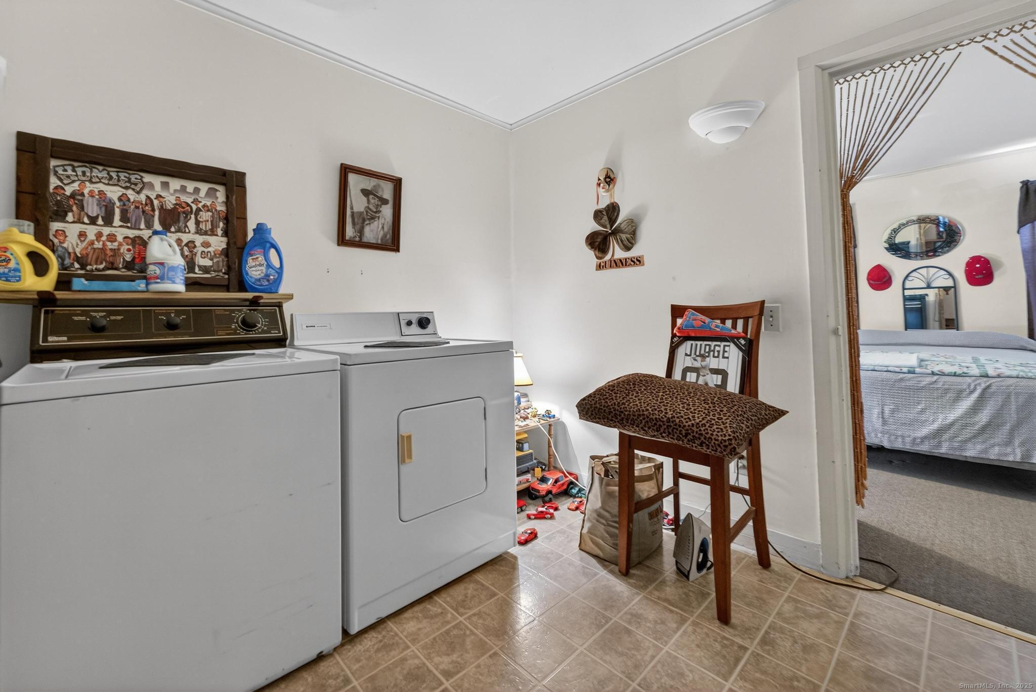 18 Broad Street Killingly, CT 06239 - Photo 21 of 21 a utility room with dryer and washer
