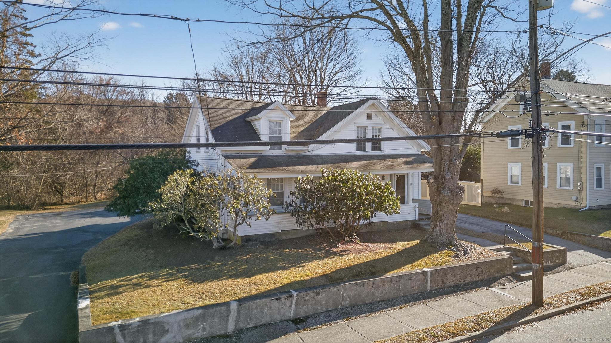 18 Broad Street Killingly, CT 06239 - Photo 3 of 21 a view of a house with a yard