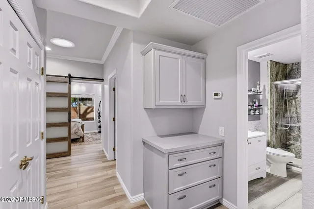 a kitchen with granite countertop a stove and a refrigerator