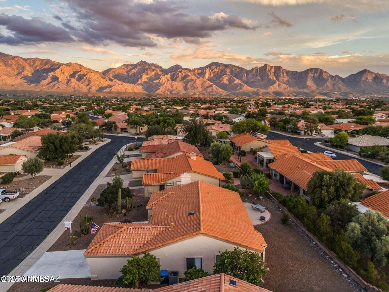 14705 North Palm Ridge Drive Oro Valley, AZ 85755 - Photo 40 of 49 an aerial view of residential houses with outdoor space and river