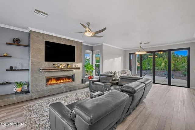an aerial view of residential houses with outdoor space and river