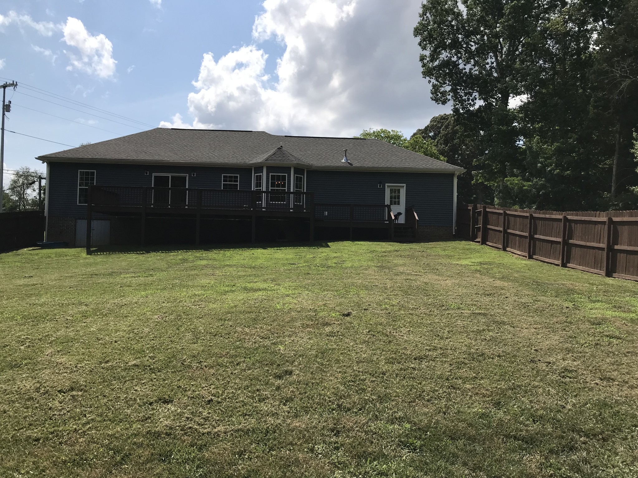 2029 Jack Teasley Road Pleasant View, TN 37146 - Photo 3 of 50 a house view with a garden space