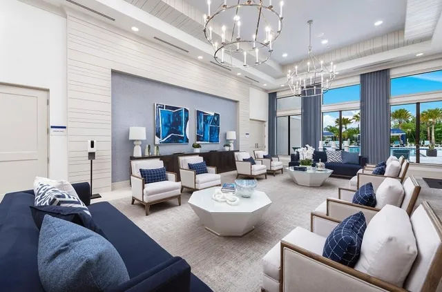 a room with lots of furniture and white walls