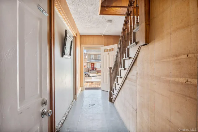 a view of an entryway with staircase