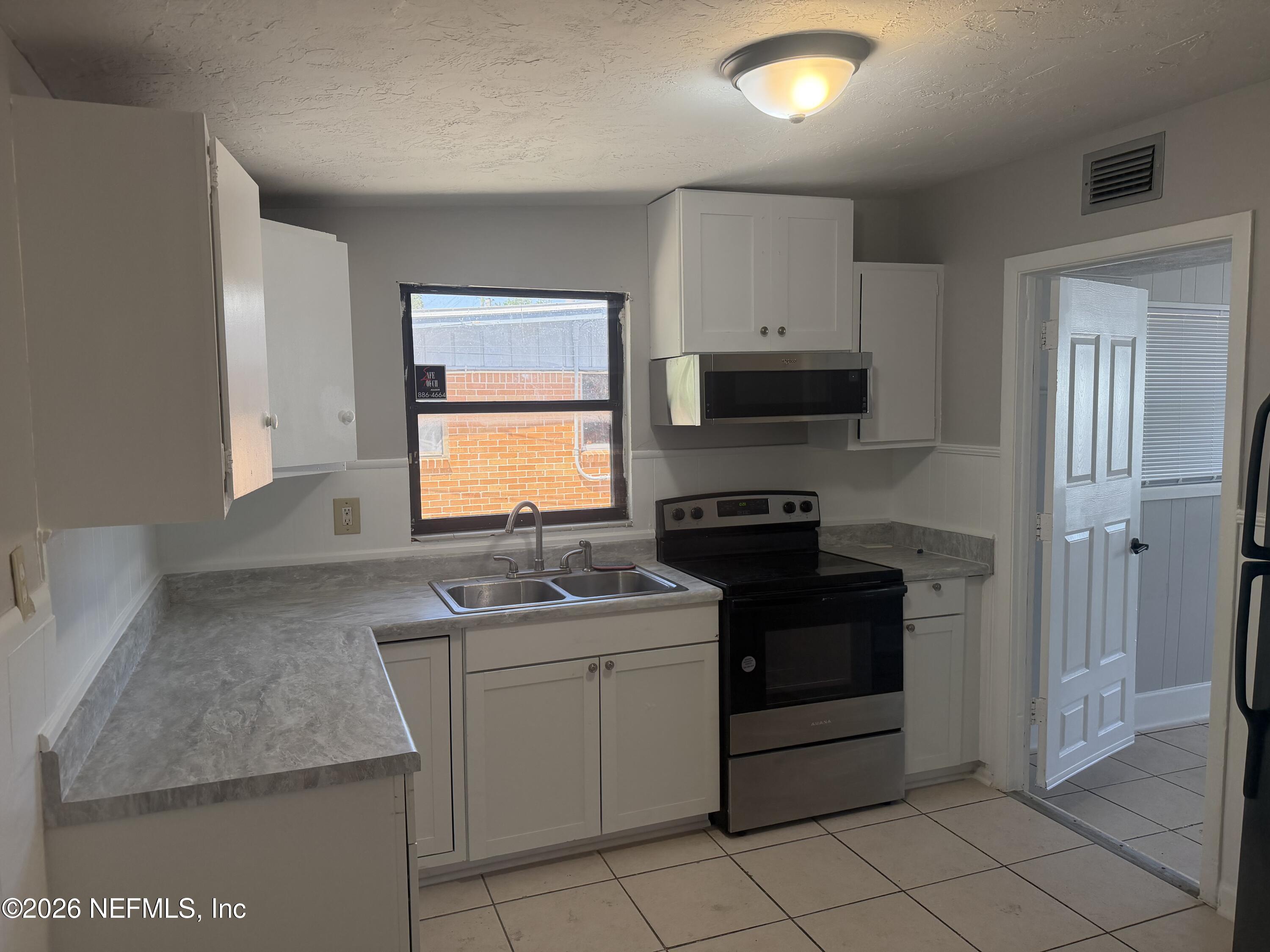 7336 Merrill Road Jacksonville, FL 32277 - Photo 3 of 8 IMG_5493