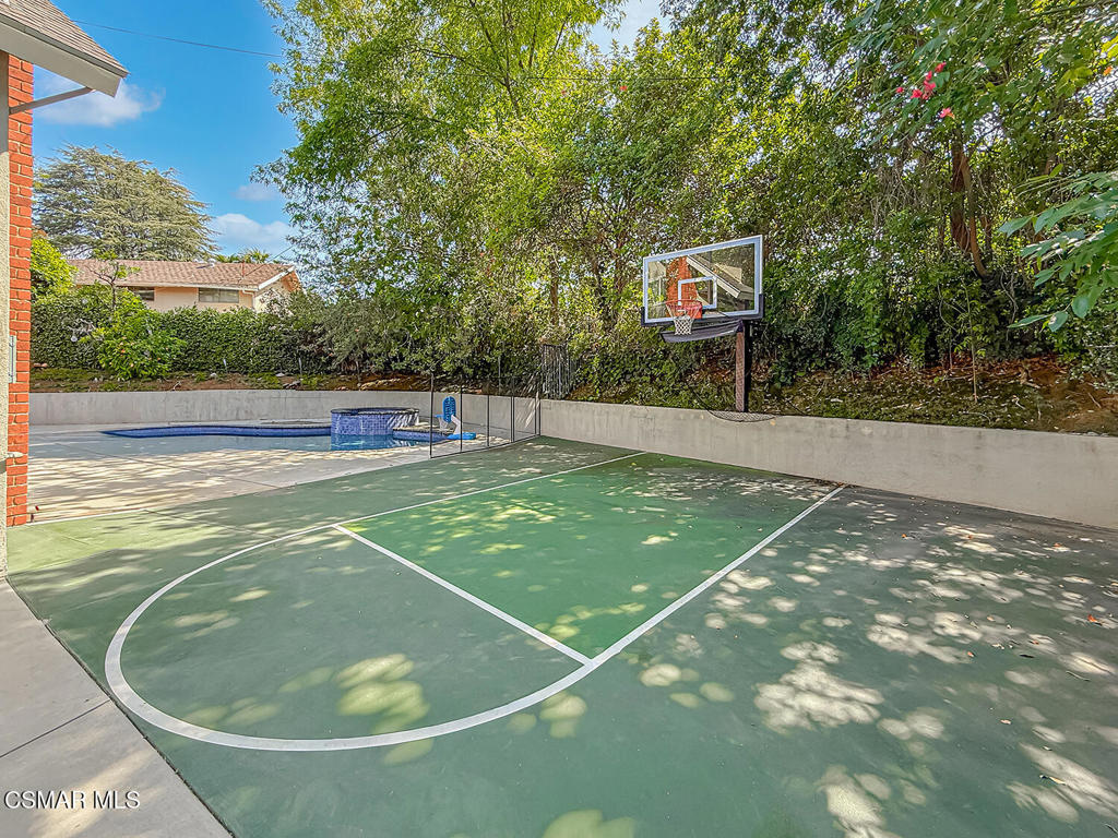 4184 Lanai Road Encino, CA 91436 - Photo 24 of 32 a view of a tennis court