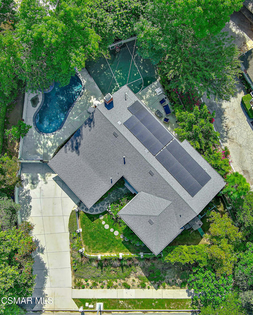 4184 Lanai Road Encino, CA 91436 - Photo 28 of 32 an aerial view of a house with a yard and outdoor seating