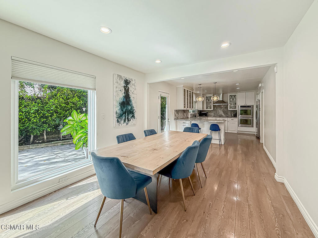 4184 Lanai Road Encino, CA 91436 - Photo 6 of 32 a view of a dining room with furniture window and wooden floor
