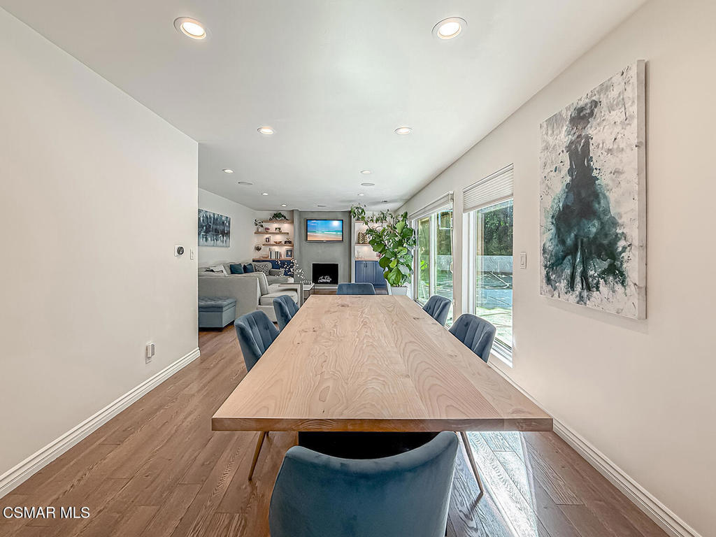 4184 Lanai Road Encino, CA 91436 - Photo 7 of 32 a dining room with furniture and window