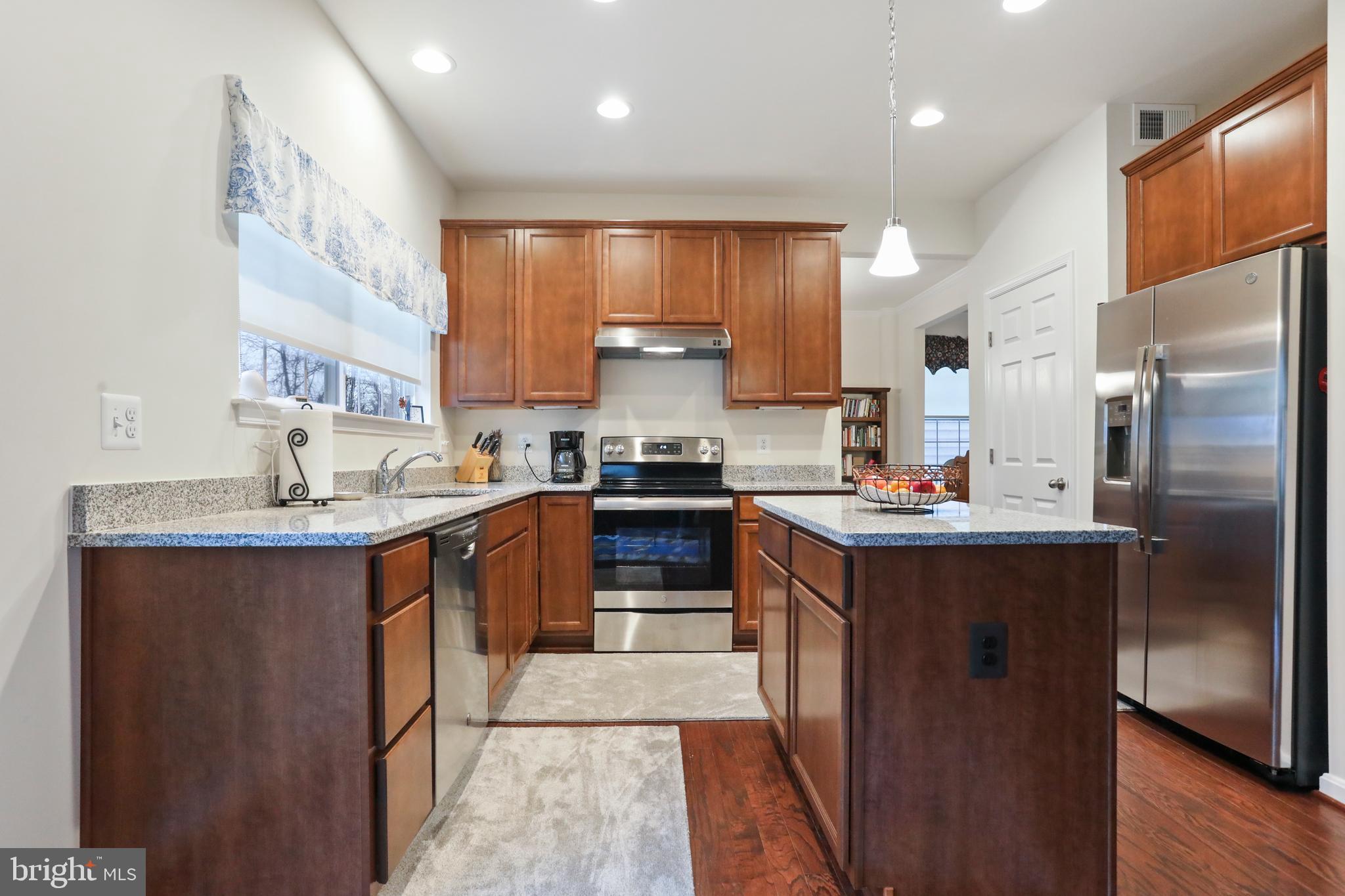 172 Deep Creek Road Ranson, WV 25438 - Photo 13 of 45 Kitchen with Granite Counters & Island