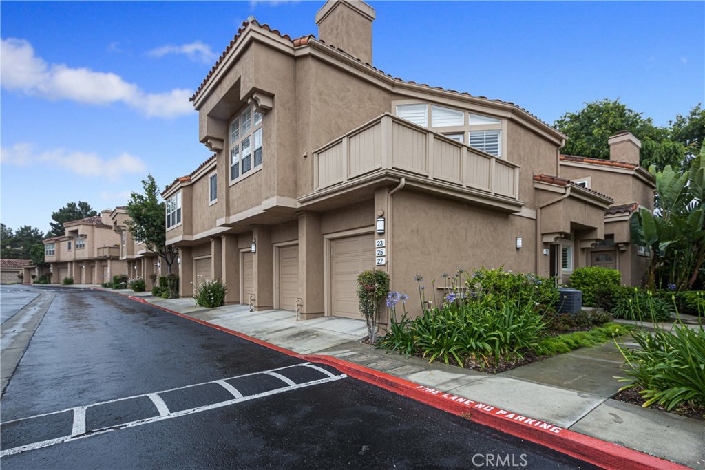 a view of a house with a street