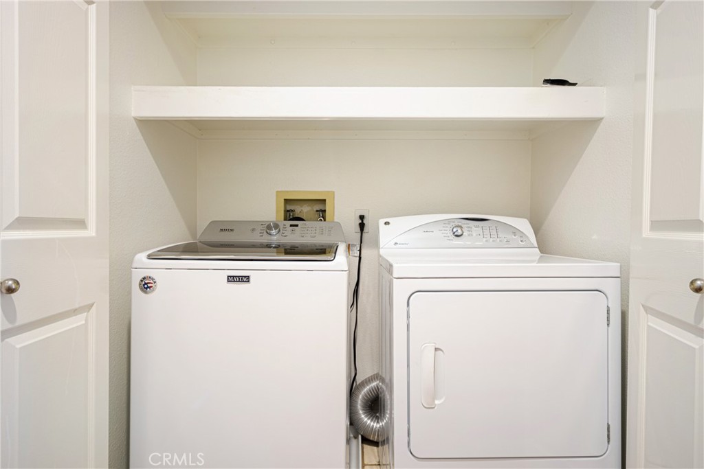 23 Ericson Aisle Irvine, CA 92620 - Photo 20 of 28 a utility room with dryer and washer