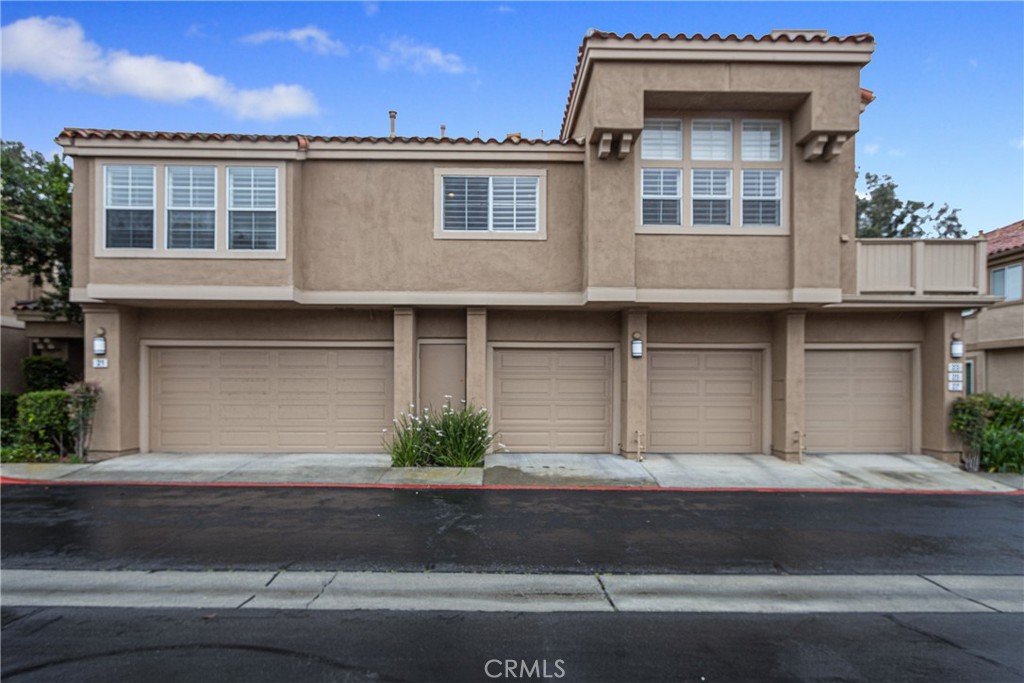 23 Ericson Aisle Irvine, CA 92620 - Photo 24 of 28 a front view of a house