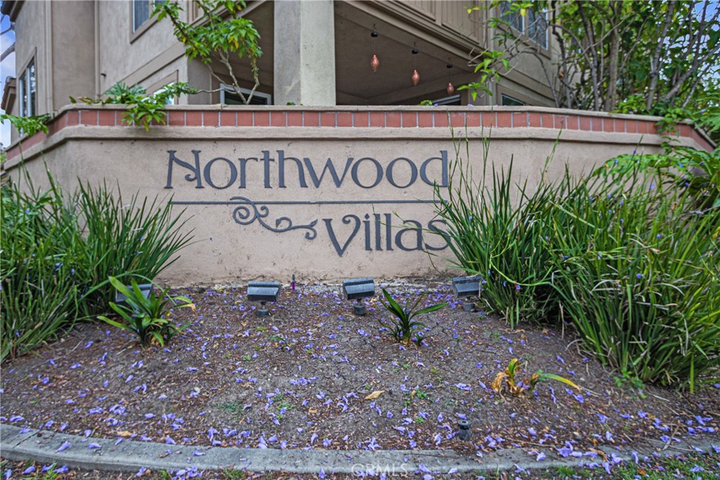 23 Ericson Aisle Irvine, CA 92620 - Photo 26 of 28 a sign on the side of a building