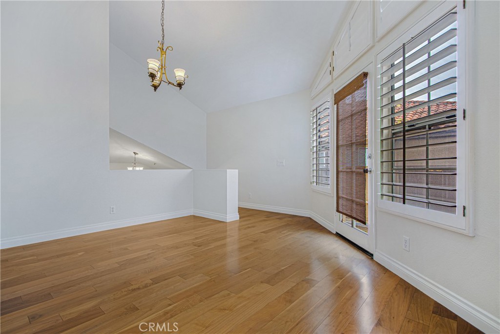 23 Ericson Aisle Irvine, CA 92620 - Photo 4 of 28 a view of an empty room with a window