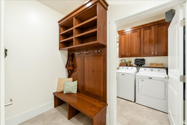 357 East Main Street Enterprise, UT 84725 - Photo 40 of 71 Laundry room featuring cabinet space, independent washer and dryer, and light floors