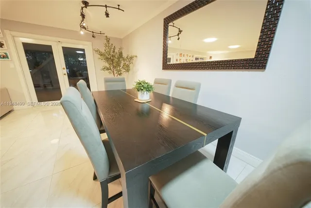 a view of a hallway with a flower pot