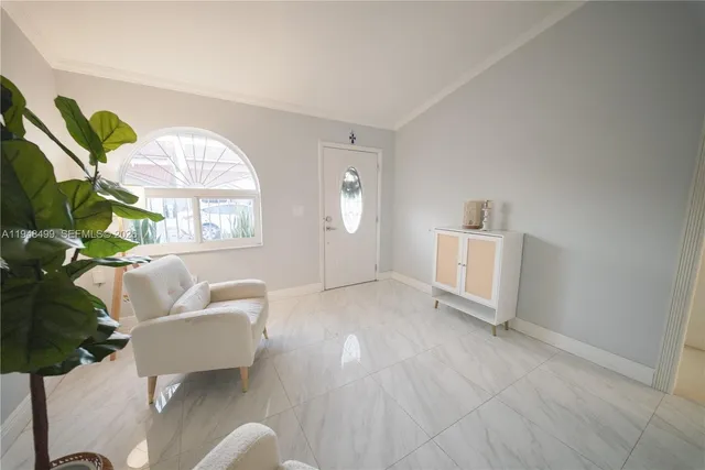 a living room with furniture and a area