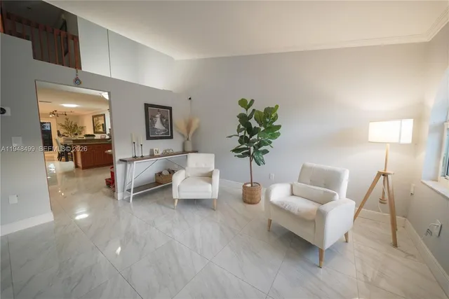 a kitchen with stainless steel appliances granite countertop a sink stove and microwave