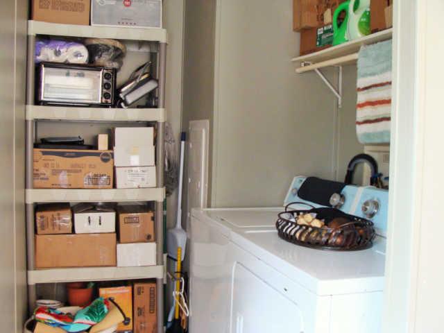 1174 Port Royal Road Adams, TN 37010 - Photo 13 of 16 Laundry room off the kitchen. Washer and dryer stay!