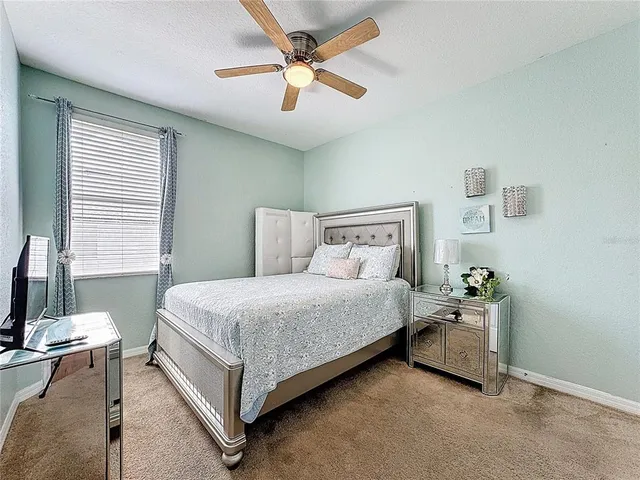 a bathroom with double vanity sinks and a mirror
