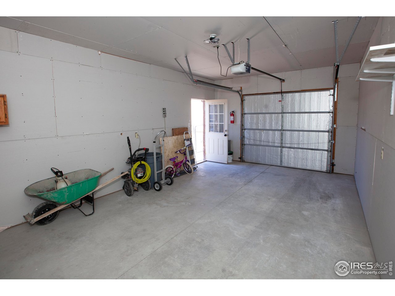 323 Cleveland Street Sterling, CO 80751 - Photo 26 of 28 a view of a garage