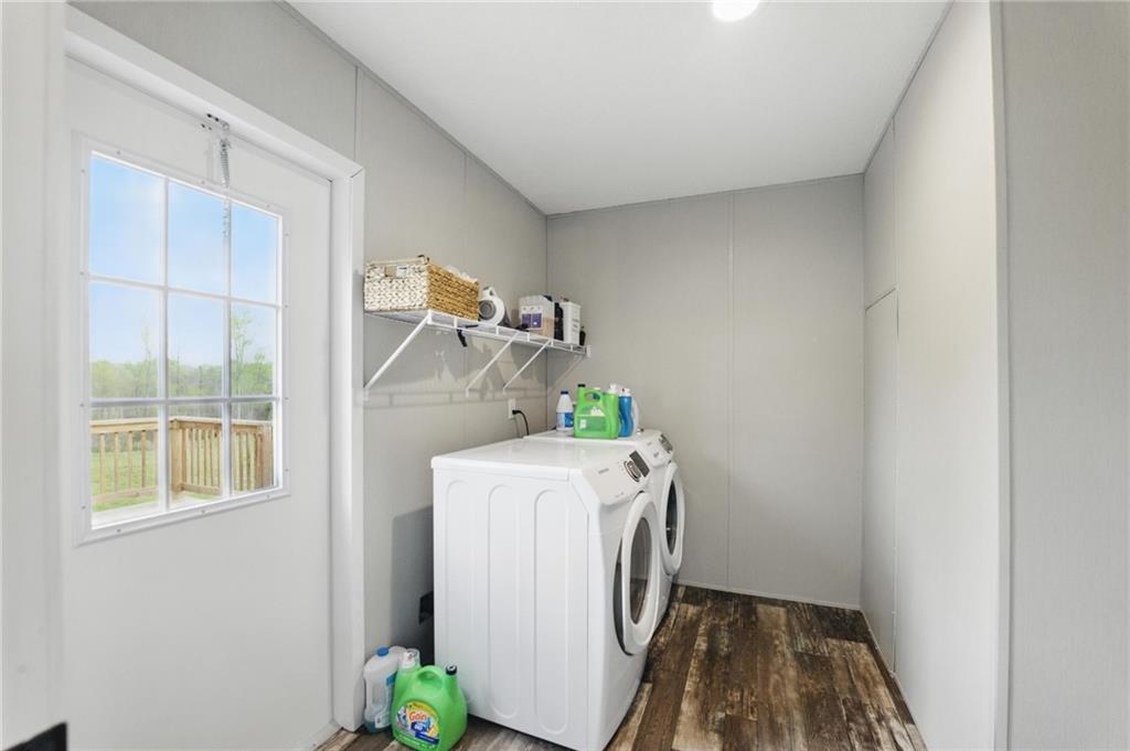 262 Garrison Road Carnesville, GA 30521 - Photo 14 of 59 a utility room with dryer and washer