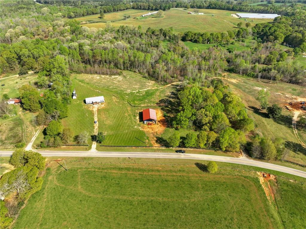 262 Garrison Road Carnesville, GA 30521 - Photo 2 of 59 a view of a swimming pool with a yard