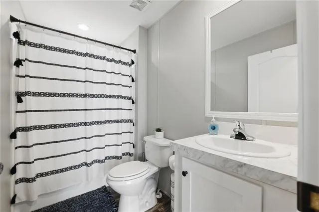 a view of a field with an ocean