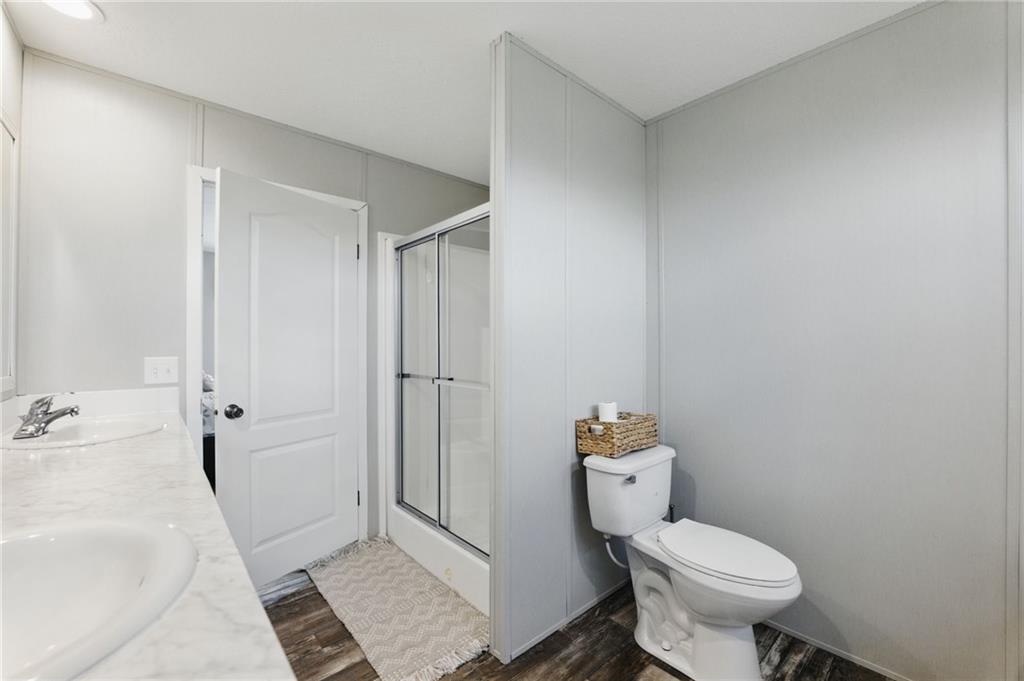 262 Garrison Road Carnesville, GA 30521 - Photo 28 of 59 a bathroom with a sink toilet and shower