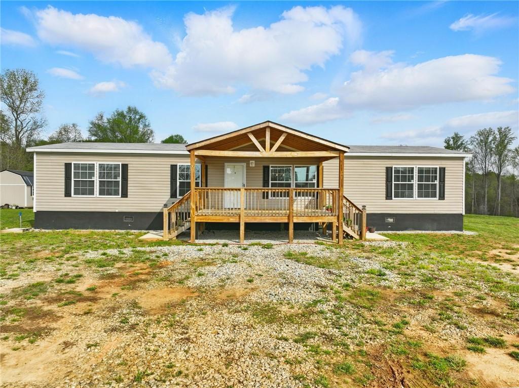 262 Garrison Road Carnesville, GA 30521 - Photo 5 of 59 a big house with a big yard and more windows